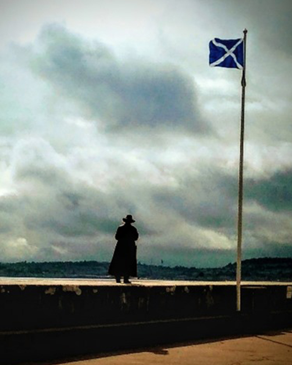 Chris walking on Torquay Pier